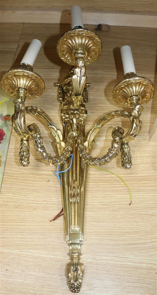 An ormolu three branch wall light height 55cm